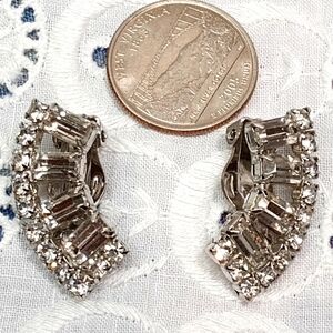 Vintage Rhinestone earrings. Beautiful silver toned rhinestone half moon clip on